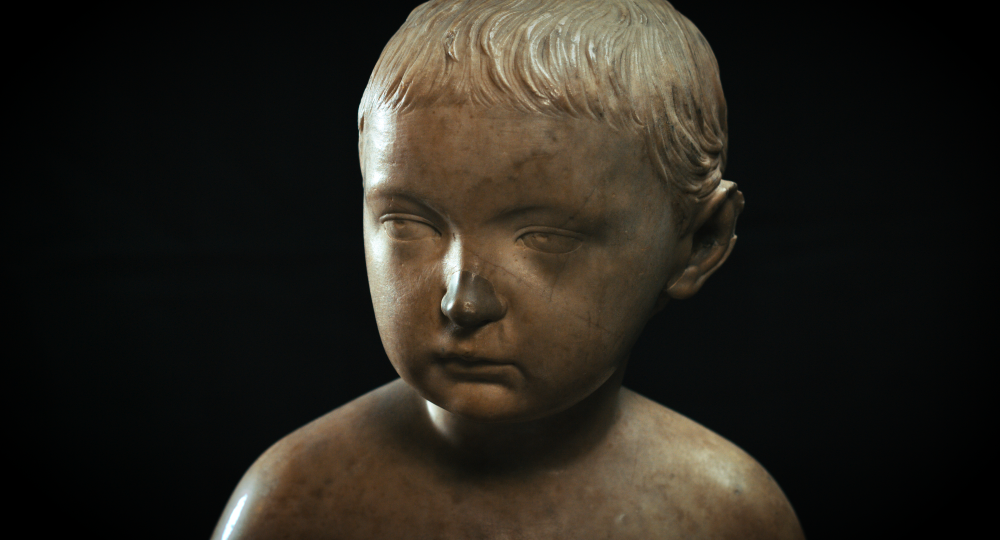 Marble bust of a boy's head and shoulders