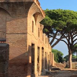 road in Ostia showing apartment buildings on either side